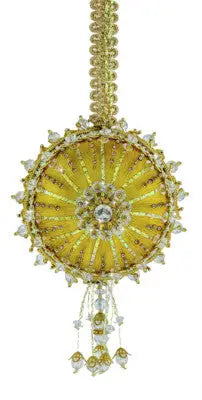 Ornate yellow and gold Christmas ornament from Cracker Box Maize Revisited kit