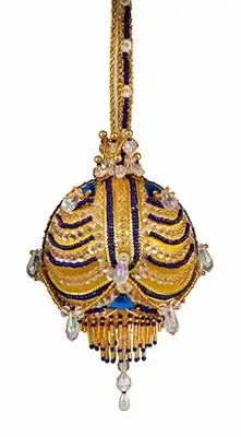 Ornate yellow and blue beaded Christmas ornament with jewel accents from Cracker Box Ornament Kit