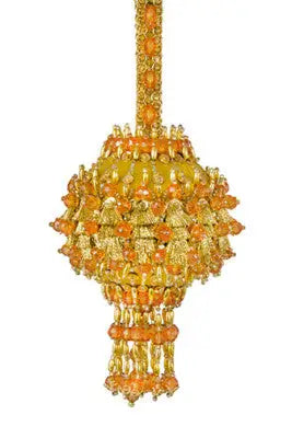 Ornate golden orange beaded tassel from The Cracker Box Inc Christmas Ornament Kit Palace