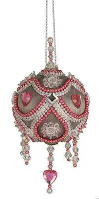 Gray and pink beaded ornament with heart-shaped jewels from The Cracker Box Baby Boobie kit