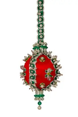 Red and green beaded Christmas ornament from Cracker Box holiday festival kit