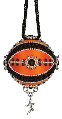 Ornate football-shaped ornament in orange and black with beaded embellishments from Cracker Box ornament kits