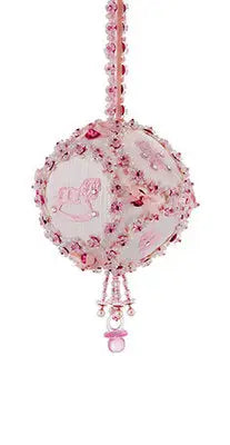Pink and white beaded baby-themed ornament with rocking horse and pacifier for Cracker Box Christmas ornament kit