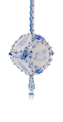 White and blue baby-themed Christmas ornament with rocking horse and pacifier designs from The Cracker Box ornament kit