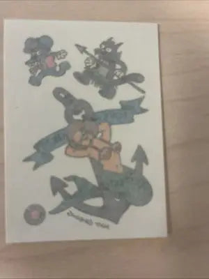 Cartoonish mermaid tattoo design from THE SIMPSONS 1993 Skybox MERMAID TATTOO product