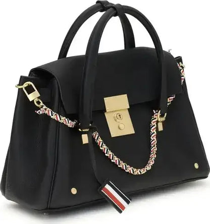 Thom Browne Mrs Thom handbag with black leather, brass rivets, and striped charm