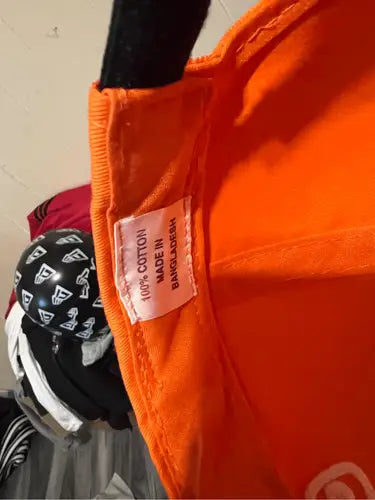 Orange 100% cotton Tide Racing Ricky Rudd hat made in Bangladesh