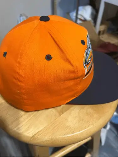 Orange Tide Racing Ricky Rudd hat with black brim and ventilation holes