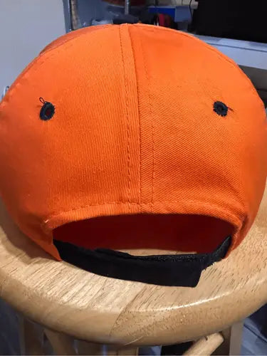 Orange Tide Racing Ricky Rudd hat with black adjustable strap