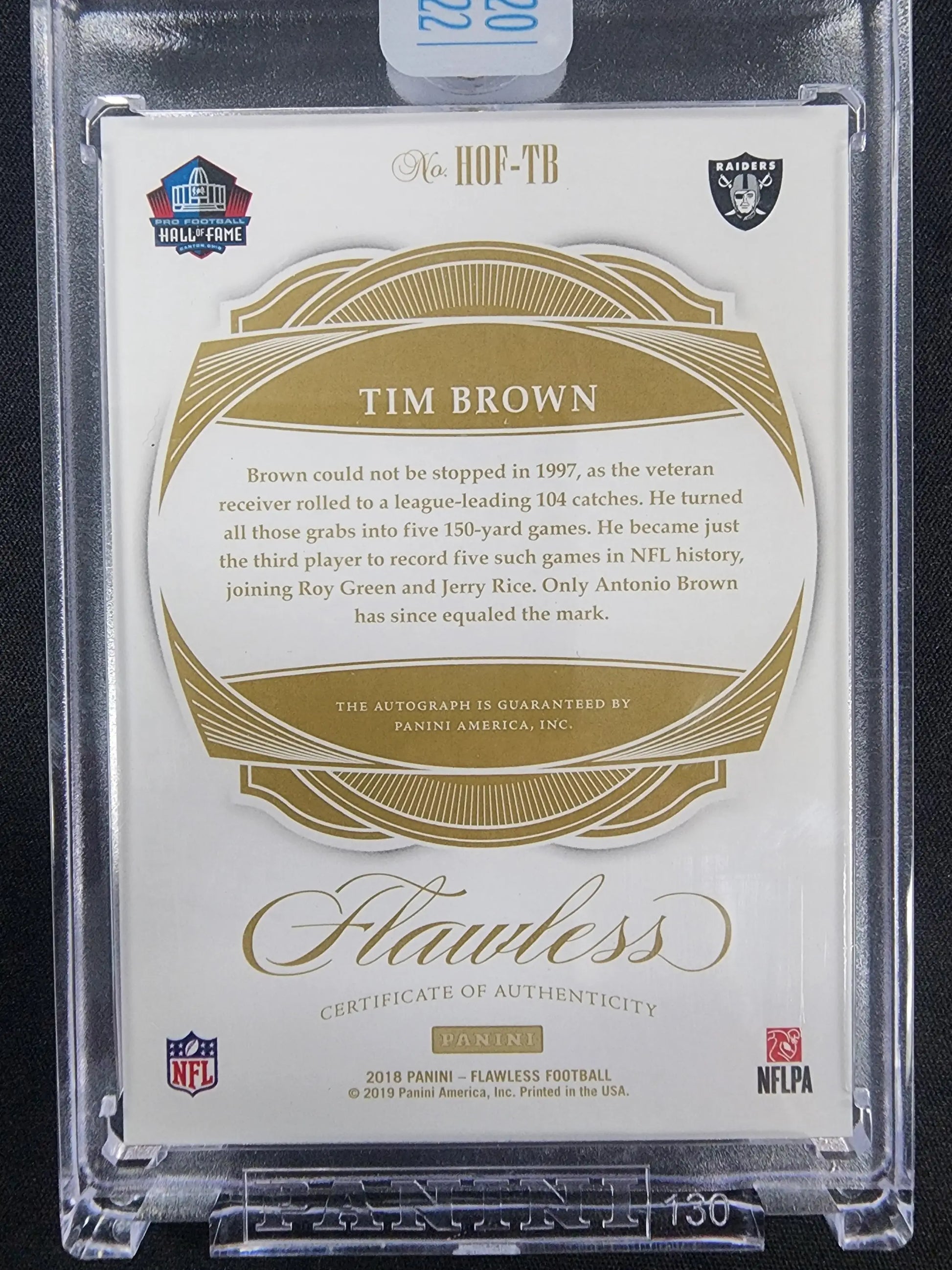 Back side of Tim Brown Panini Flawless Honors Buyback Auto card in protective case