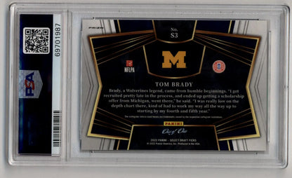 Tom Brady 2022 Select Draft Picks Snapshots card in case with Michigan M logo and gold accents