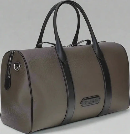Sophisticated gray travel bag with black straps and handles from Tom Ford Men’s collection