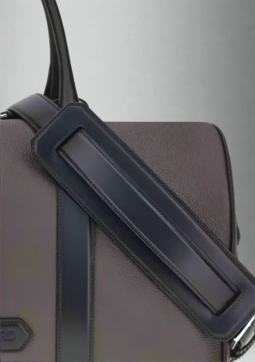 Brown leather travel bag with dark blue shoulder strap for Tom Ford Men’s Travel Bag