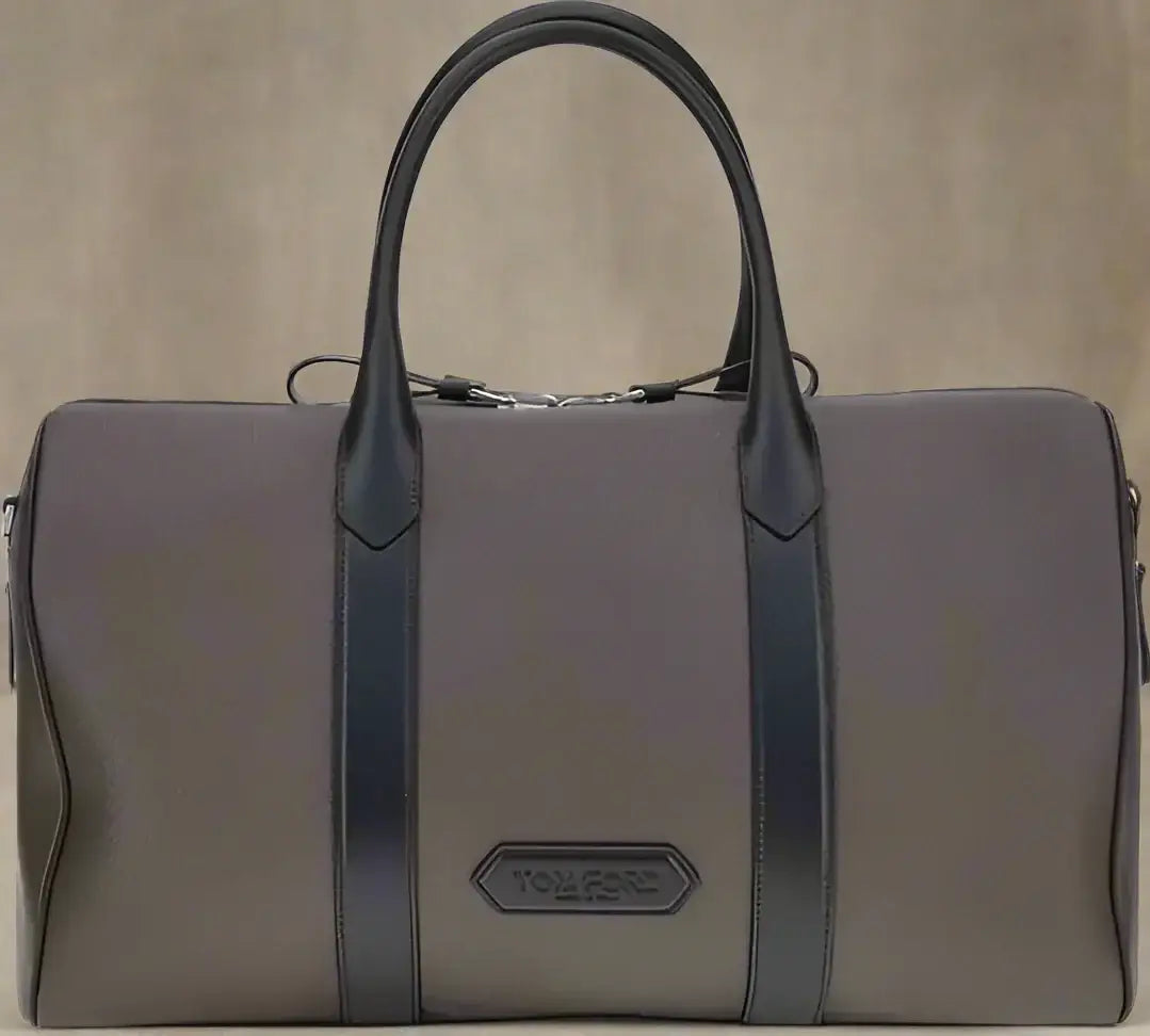Dark gray duffel travel bag with black leather handles for Tom Ford Men’s Travel Bag