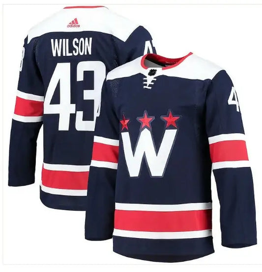 Two Washington Capitals navy blue hockey jerseys featuring Tom Wilson Washington branding