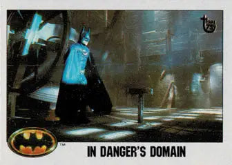 Caped figure with pointed ears in dark setting on Topps 75th Anniversary Gold Foil Card