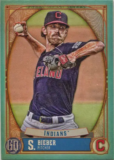 Baseball card of Cleveland Indians pitcher Shane Bieber in mid-throw, turquoise parallel