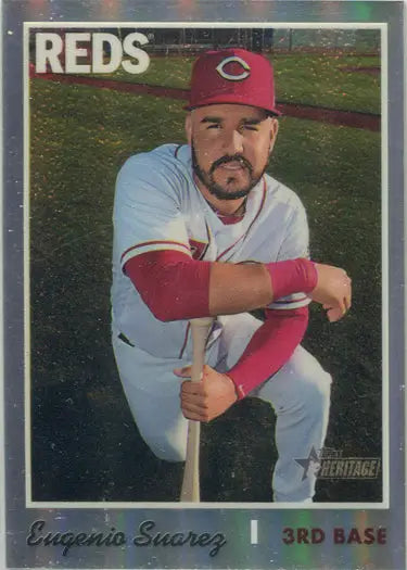 Baseball card of Eugenio Suarez in Reds uniform, a Topps chrome refractor collectible