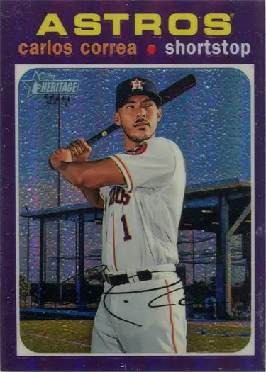 Baseball card of Carlos Correa in batting stance, featuring a Purple Chrome Refractor design