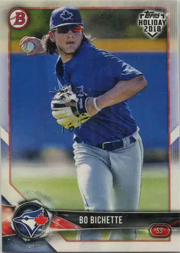 Baseball player in blue throwing ball, featured on Topps Holiday Bo Bichette base card