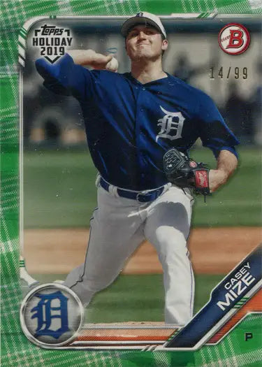 Baseball card of Detroit Tigers pitcher Casey Mize in mid-throw, green border parallel design