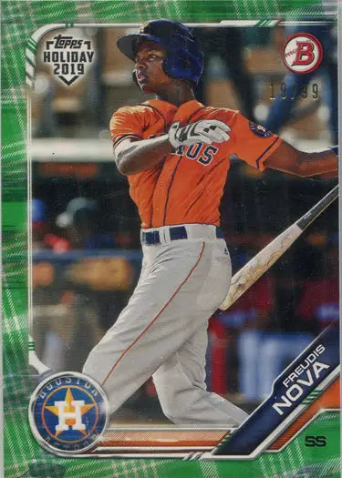 Baseball card of Houston Astros player Freudis Nova in mid-swing green border parallel