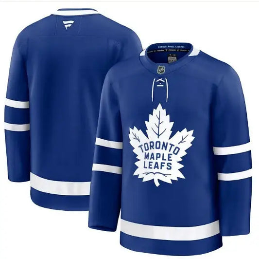 Blue Toronto Maple Leafs hockey jersey with white maple leaf logo displayed in product image