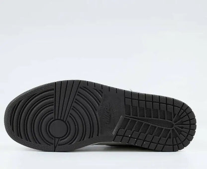 Black rubber sole of Travis Scott x Air Jordan 1 High Mocha sneaker with circular pivot and traction pattern for fast shipping