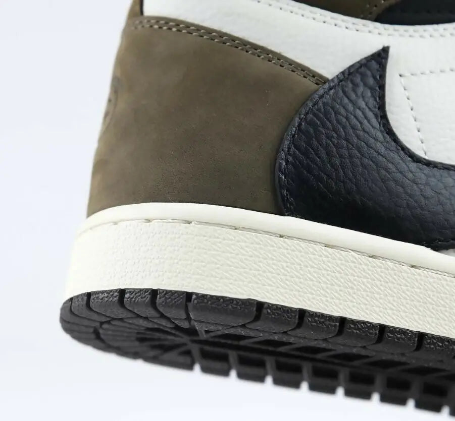 Close-up of Travis Scott x Air Jordan 1 High Mocha sneaker with olive green suede and black leather, fast shipping