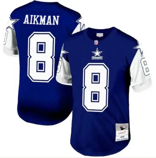 Blue and white Troy Aikman Dallas Cowboys Legacy Replica Jersey displayed in navy