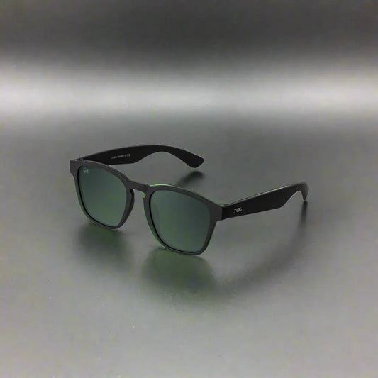 Twig Unisex green polycarbonate UV3 sunglasses with dark frames and green-tinted lenses