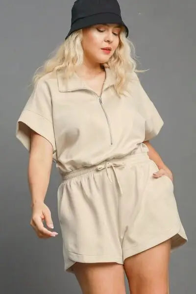Women’s beige dolman sleeved romper with zipper and drawstring waist for plus size fashion