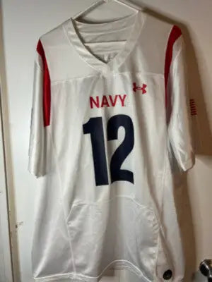 White Navy football jersey with red accents and number 12 from Under Armour Men’s XL