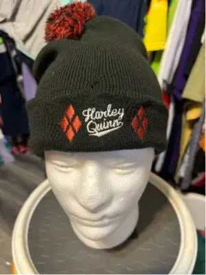 Black Harley Quinn pom-pom beanie with red diamond patterns for Batman DC Comics fans