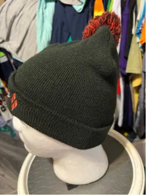 Black knit Batman DC Comics Beanie Hat with Harley Quinn red diamond pattern and pom-pom