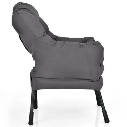 Gray cushioned accent chair with polyester fabric, black legs, and armrests for relaxation
