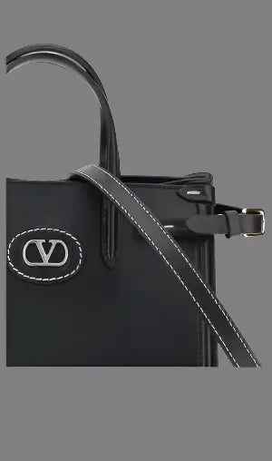Black leather Antibes handbag with metallic V logo and white stitching