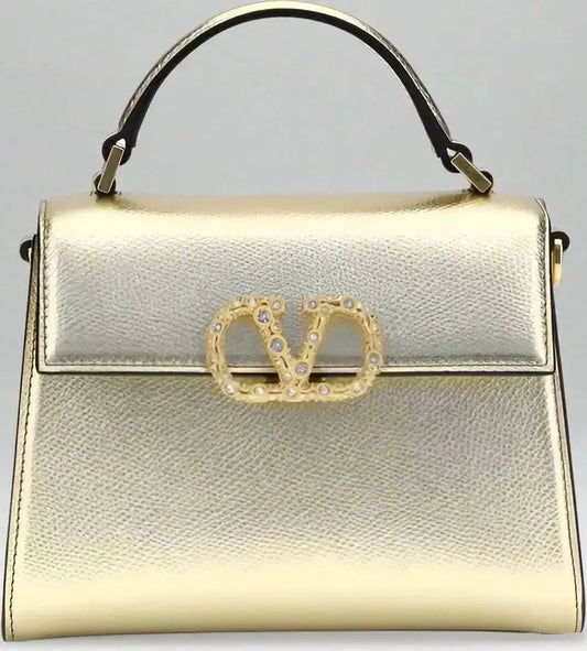 Valentino Garavani metallic garnet mini handbag with top handle and crystal V-logo clasp