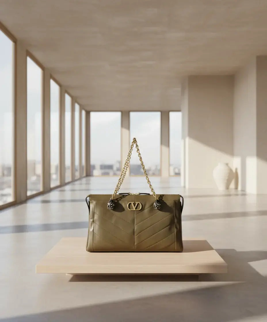 Olive green nappa leather Valentino Garavani Panthea Bag with gold chain strap and logo