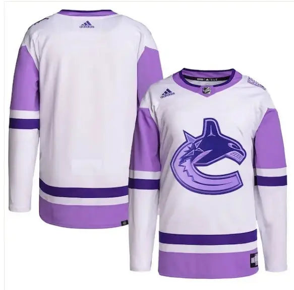 White and purple Vancouver Canucks hockey jerseys with logo for adidas Hockey Fights Cancer