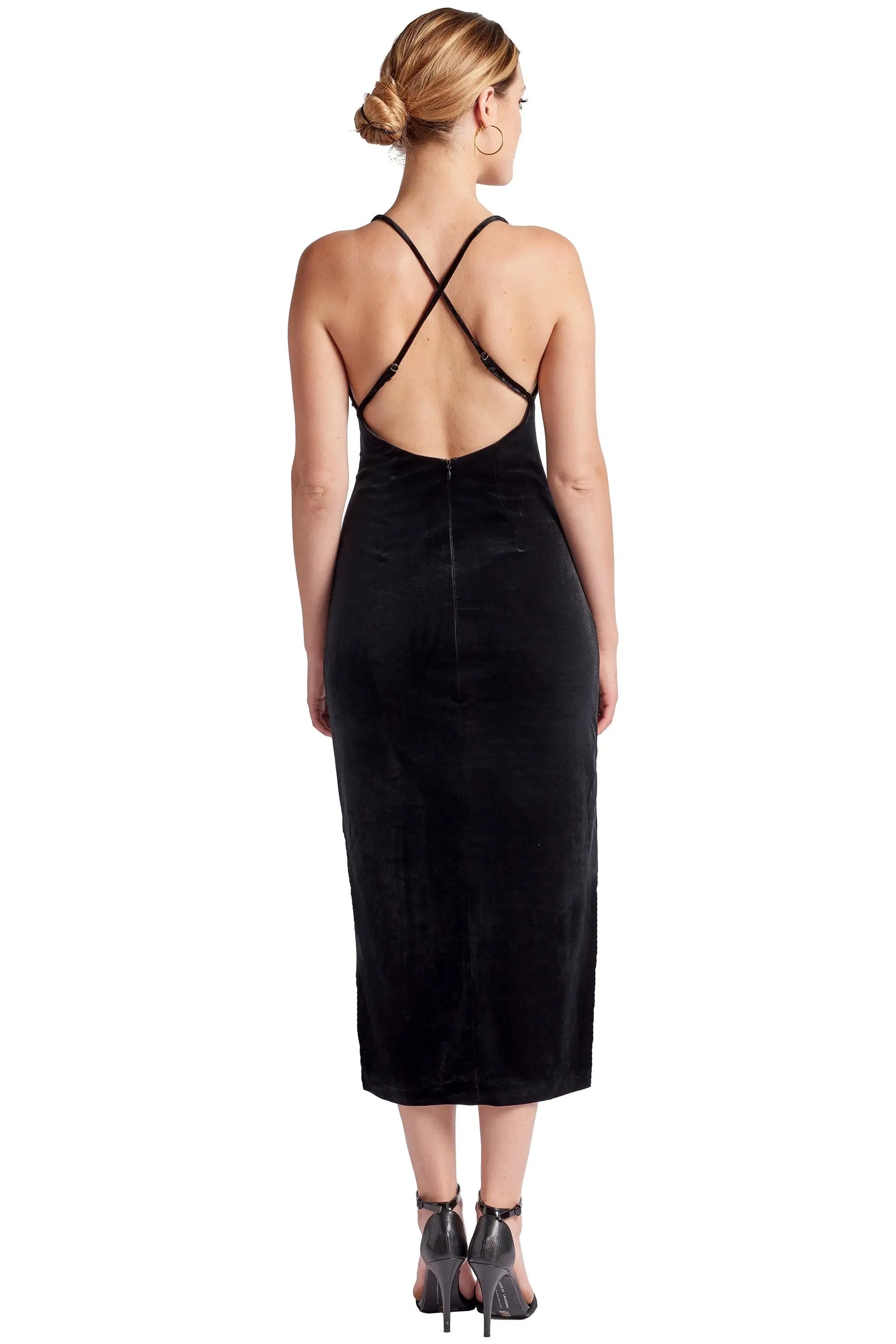 Women’s black velvet slip dress with thigh high slit and criss-cross back straps