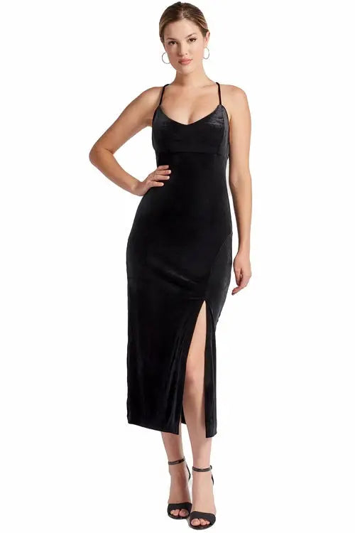 Women’s black velvet slip dress with thigh high slit and thin straps for elegant style