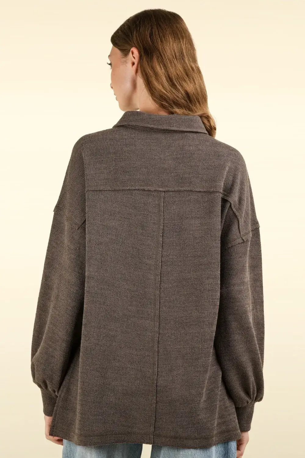 Brown textured jacket with pockets and collared half button knit design for versatile style
