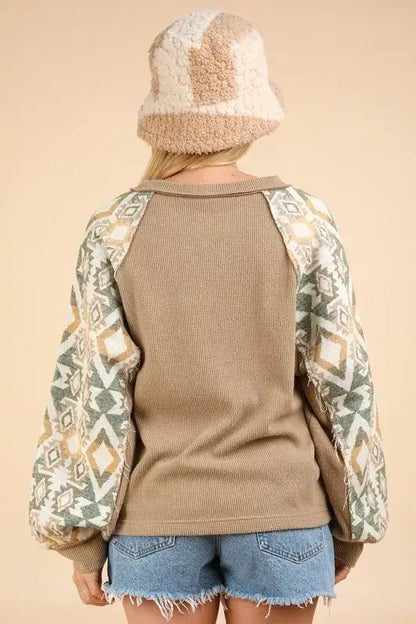 Beige and green printed long sleeve round neck knit top with balloon sleeves