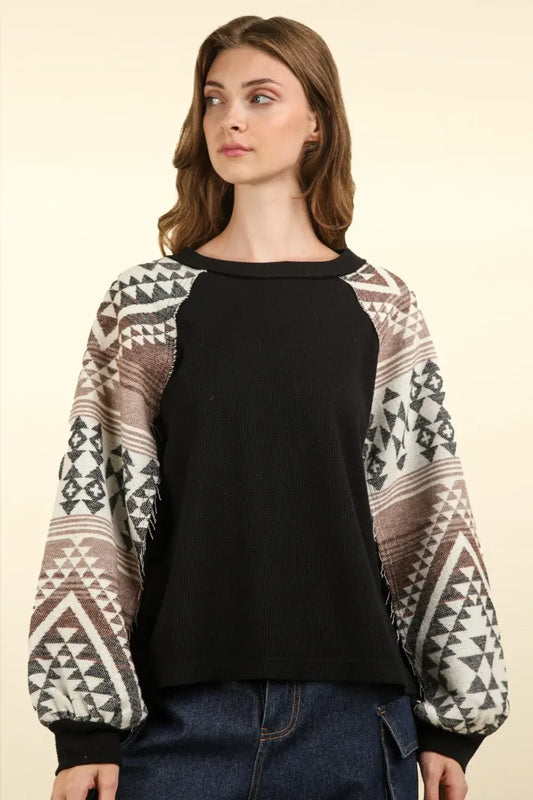 Black geometric printed long sleeve round neck knit top with balloon sleeves
