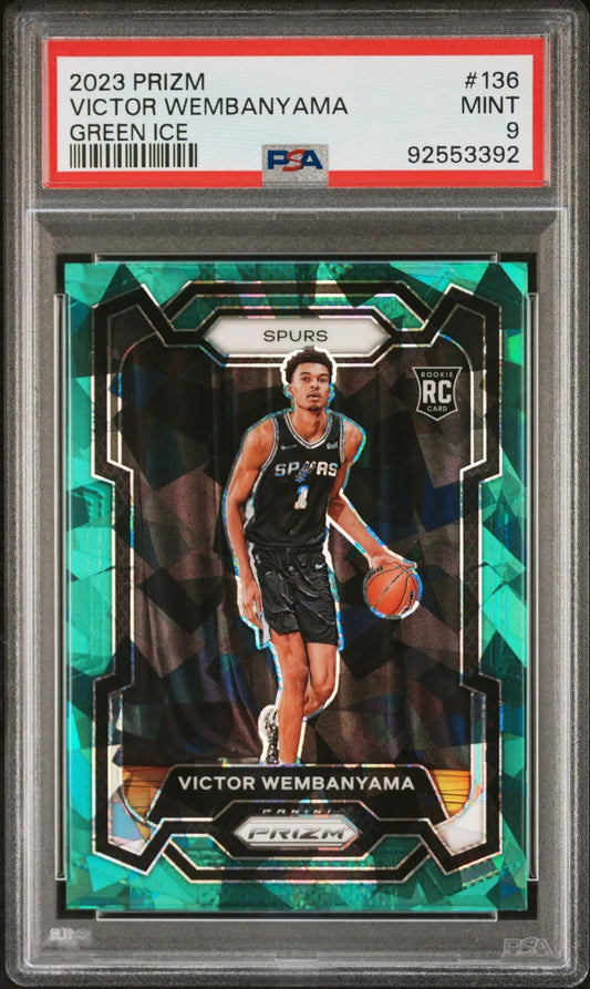 Victor Wembanyama 2023 Panini Prizm Green Ice PSA 9 Mint card dribbling in black uniform