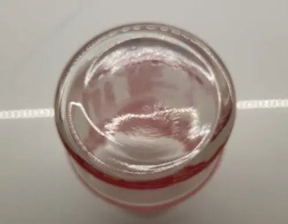 Glass jar with red and white stripes for Ohio State Championship souvenir drinking glass