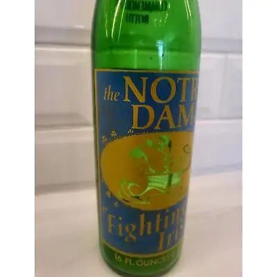 Green glass bottle from Vintage 1973 7UP Notre Dame Fighting Irish commemorative