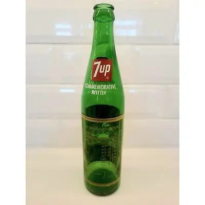 Green 7UP commemorative bottle featuring Notre Dame Fighting Irish logo and design