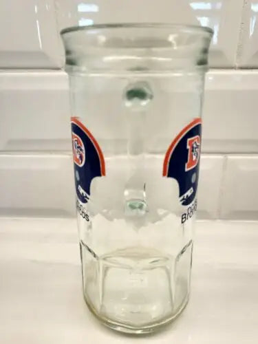 Vintage 1980s Denver Broncos NFL Football glass mug featuring iconic team graphics